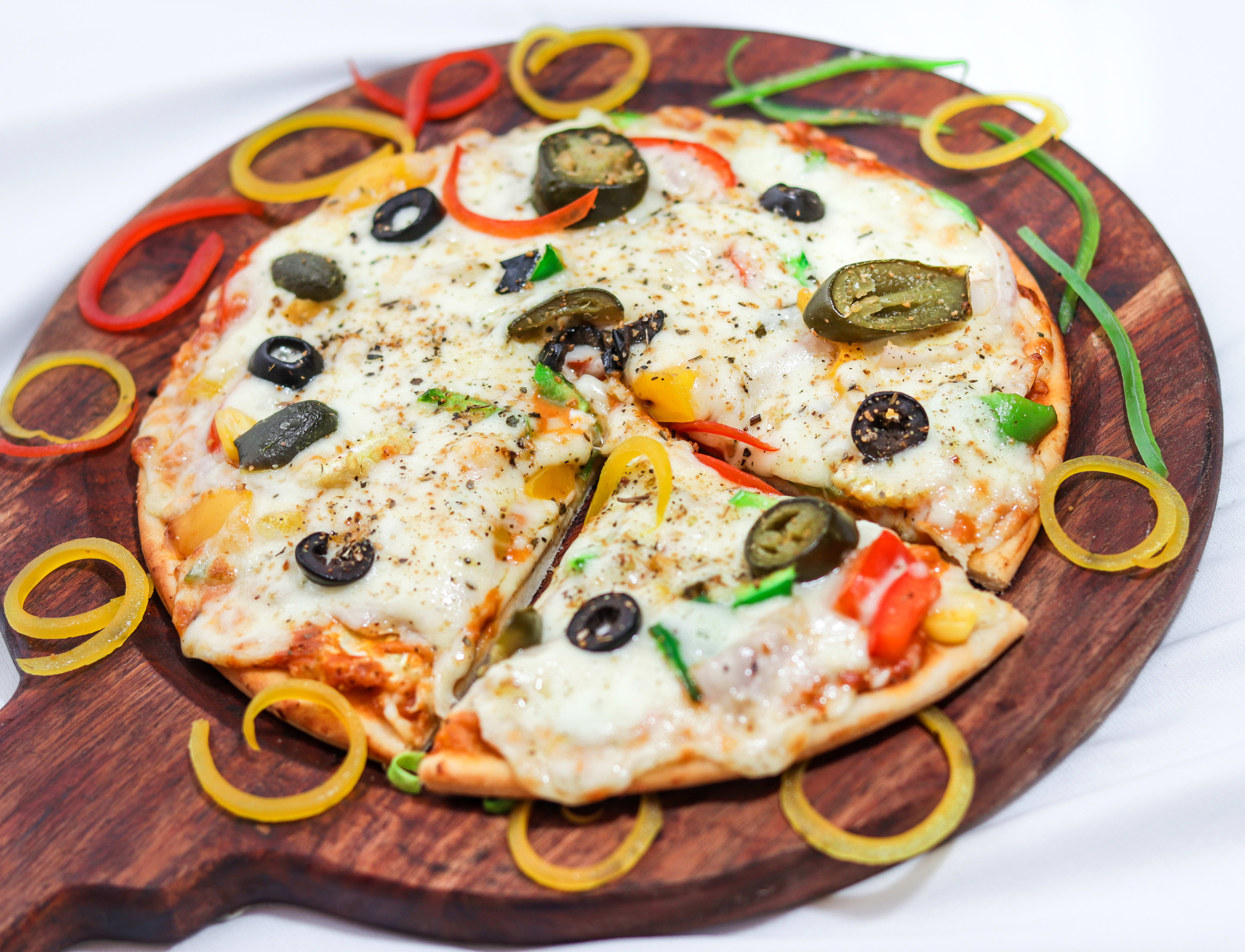 Wooddy Jhone's Pizza Home delivery Order online Piplod Piplod Surat