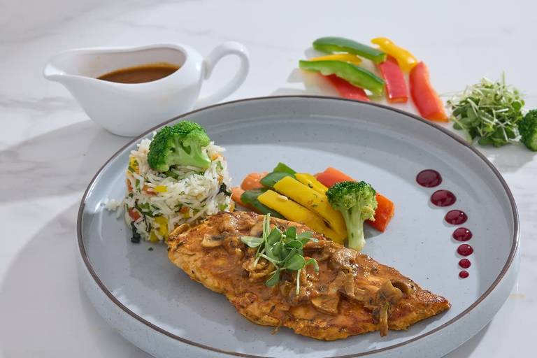 Pan Seared Chicken With Herb Rice And Jus