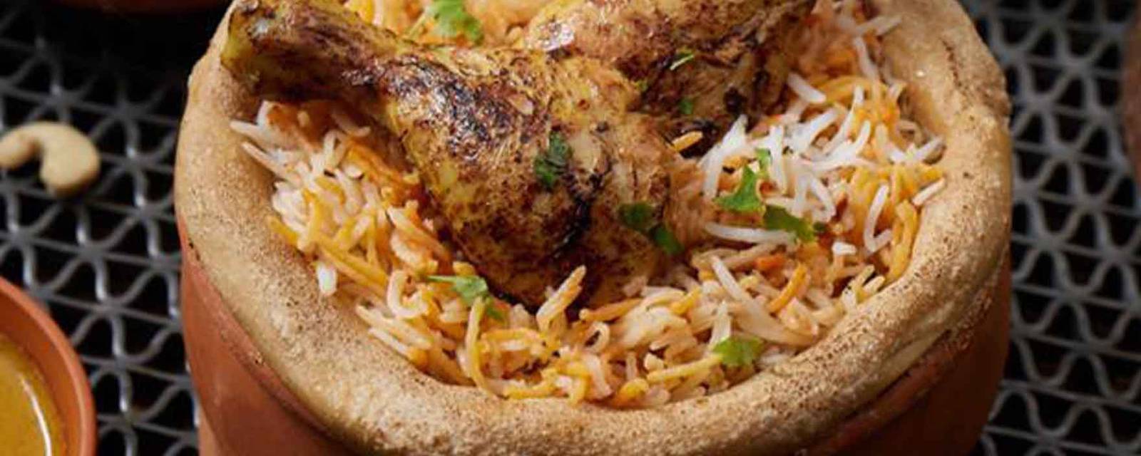 Dum Pukht Biryani By Aromas cover
