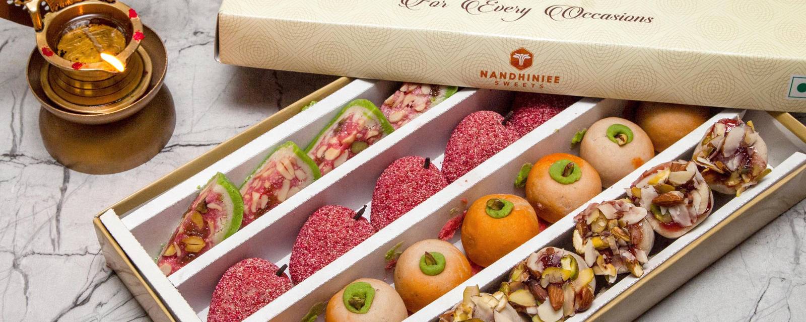 Nandhiniee Sweets & Restaurant cover