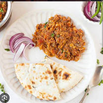5 butter Tawa Roti with Baigan ka chokha