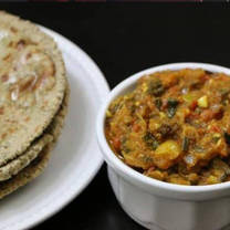 2 Bajre ki Roti (chulhe wali) with Baigan Ka Chokha