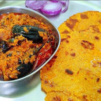 2 Makke ki Roti with Baigan ki masale daar subji