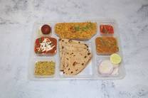 Golden Punjabi Thali (Jain Not Available) (1 Paneer Sabji + Veg Sabji + 4 Butter Roti + 1 Special Biryani + Salad + Achar + Sweet + Mukhwash)
