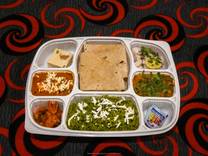 Gold Punjabi Thali (Jain Not available) 1 Special Paneer Sabji + 1 Veg.Sabji + 4 Butter Roti + 1 Spl.Veg. Biryani + Sweet + Salad + Mukhwas