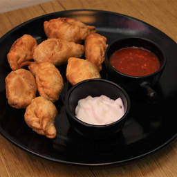 Schezwan Momos (Veg)