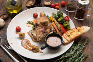 Grilled Chicken Steak In Creamy Mushroom Sauce