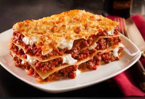 Double Lamb Lasagne [bolognaise Tomato N Bechamel Cheese Sauces,mozzarella,cheddar,herbs,spices]