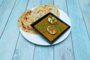 Parotta 2 Pcs + Egg Masala