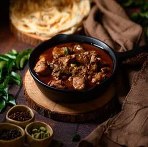 Chicken Varutharachathu