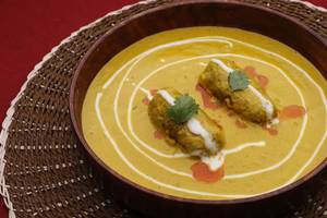 Veg Kofta In Rich Yellow Gravy