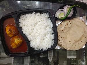 Egg Thali (2 Egg with gravy, 2 Tawa Roti with Rice & Salad)