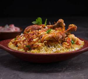 Chicken Leg Biryani With Raita & Papad