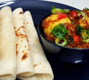 Egg Curry With 4 Butter Roti & Chutney