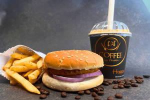 Veg. Cheese Burger + French Fries (s) + Cold Coffee (s)