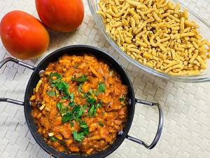 Sev Tamatar Sabzi +5 Roti + Salad