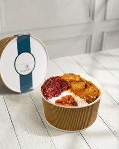 Kozhi Malli Peralan - Rice & Curry  in a bowl