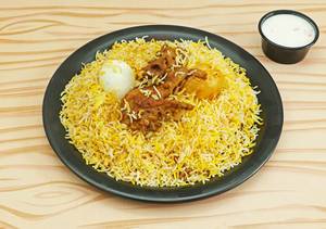 Kolkata Chicken Biryani With Chicken Kosha (2 Pcs) And Raita