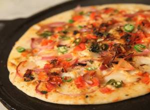 Uttapam [with coconut chutney+sambhar+garlic chutney]