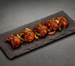Chicken Tossed Chilli Momos