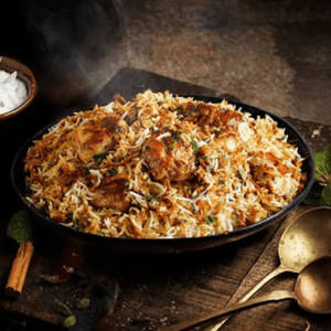 Lucknowi Chicken Dum Biryani (boneless)