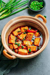 Braised Tofu And Mushroom Calypot In Chilli And Blackbean Sauce