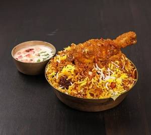 Chicken Biryani  650ml With ( Raita And Salan)