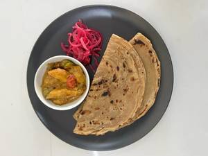 Kadai Fish With Lachha Paratha And Onion Salad