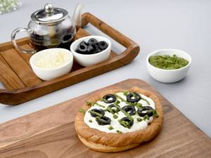 Pesto , Olive & Cream Cheese Croissant Pizza