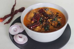 Varutharacha Chicken Curry.