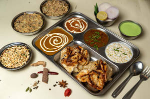 Dilli Special Chur Chur Naan With Shahi Paneer Thali