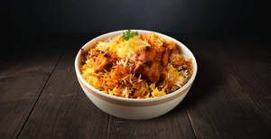 Chicken Biryani(served With Raita And Gravy)