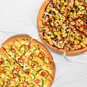 Super Value Deal : 2 Medium Veg Pizzas starting at Rs 649 (Save Upto 41%).