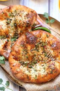 Aloo naan + butter + chane