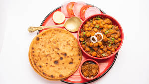 Paneer Gobhi Paratha With Chole And Buttermilk