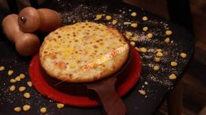 Gold corn pizza