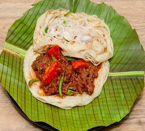 Kizhi Parotta (chicken)