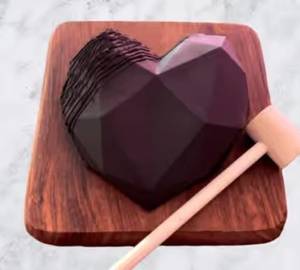 Dark chocolate pinata cake heart 