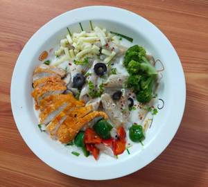 Whole wheat penne alfredo in creamy white sauce chicken and vegetables