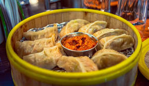 Chicken Steamed Momos [8 Pieces] with Special Schezwan Chutney