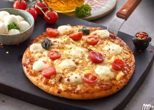 Cheese Tomato And Capsicum Pizza