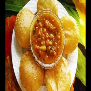 Puri with Potato Bhaji (Gravy)
