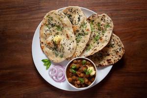 Chhole Served With Butter Naan