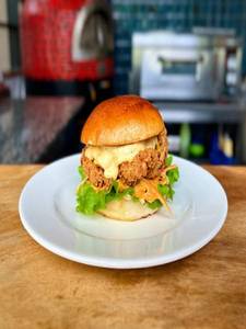 Buttermilk Fried Chicken Burger With Sriracha Slaw.