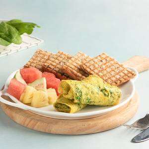 Spinach Omelette And Cut Fruits