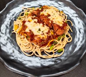 Veg spaghetti pasta in spicy tomato olive sauce