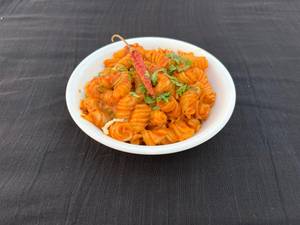 Veg sizzling schezwan pasta