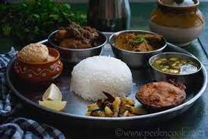 Jumbo chicken thali( rice dal sukhi sabzi chicken curry paratha desert salad papad)
