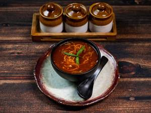 Veg Noodles Schezwan Soup