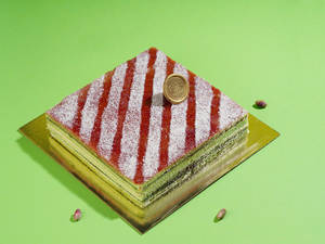 Raspberry Pista Lamington Cake